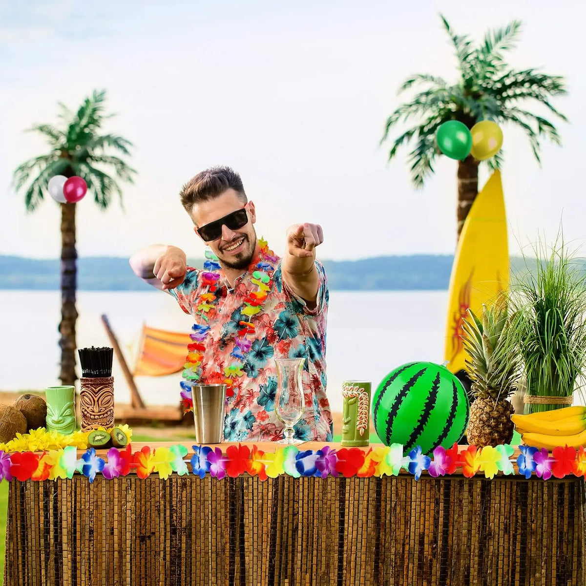 37 piece inflatable Hawaiian themed party set, including inflatable palm trees, inflatable banana beach balls, flamingo toys, flying parrots and dolphins, Hawaiian flower garlands, turtle back bamboo leaves, Hawaiian flowers,